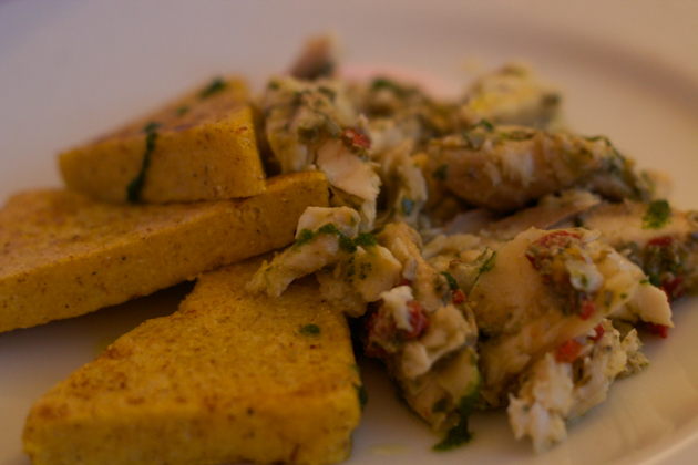 Luccio in salsa (salt cod cooked with capers, parsley, peppers and anchovies served with grilled polenta)