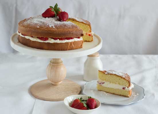 Genovese sponge cake filled with strawberries and cream
