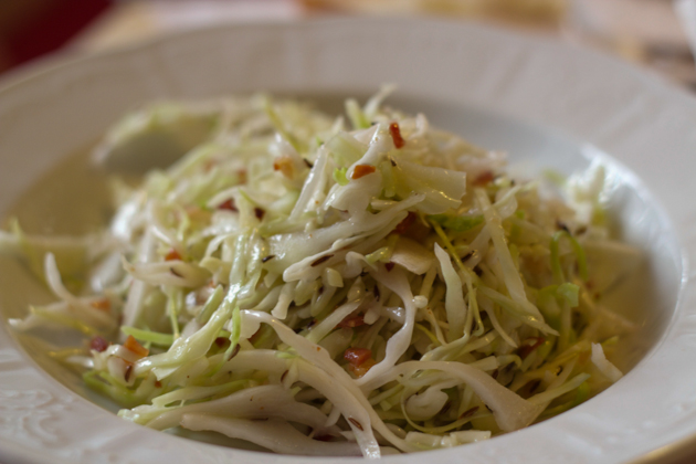 Coleslaw (cabbage dressed with oil, vinegar, caraway seeds and bacon)