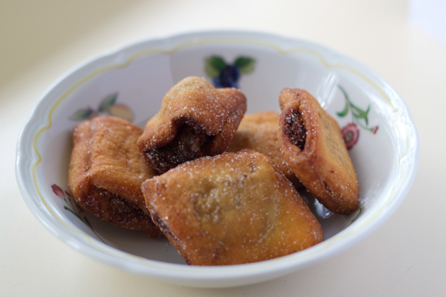 Strucchi (small bundles of fried puff pastry filled with dried fruit and grappa or rum from Udine)