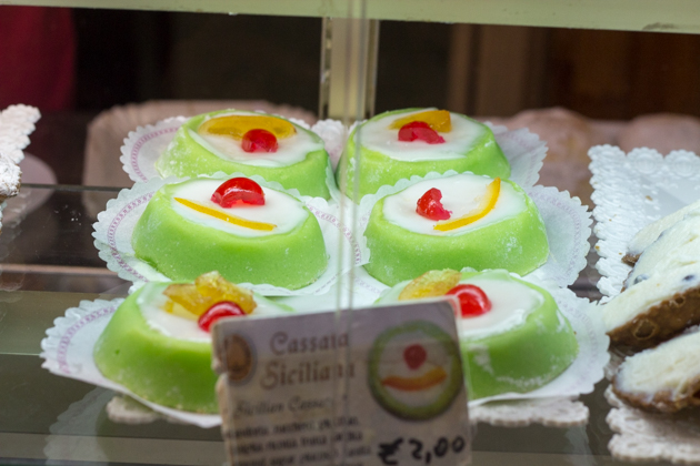 Cassata (an elaborate sponge cake encased ricotta covered in marzipan, icing and candied fruit)