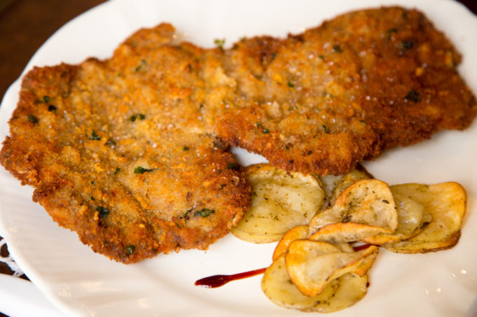 Cotolette alla palmeritana (a breaded and fried cutlet of veal flavoured with garlic, cheese, capers and olives)