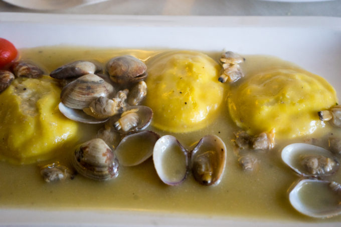 Fish ravioli with clams