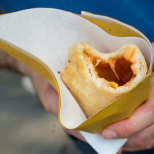 Panzarotto (a deep-fried pizza pocket filled with molten mozzarella and tomato sauce)