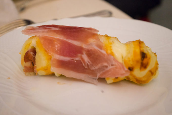 Grilled scamorza cheese with prosciutto